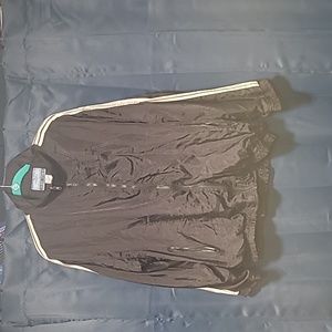 Large black zip up track suit/windbreaker coat with white stripes on the side